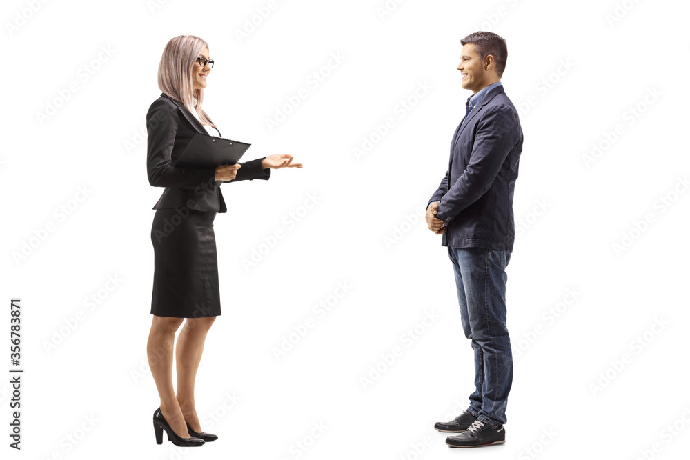 Professional man and woman standing and talking talking Professional man and woman standing and talking talking