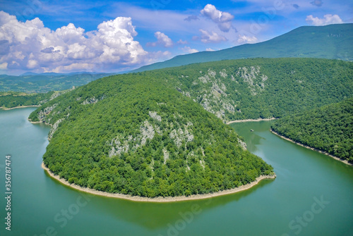 Aerial view over lake Bocac near city of Banja Luka in Bosnia and Herzegovina during sunny spring day. photo