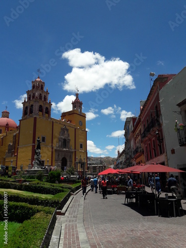 Guanajuato Mexico yellow church and street scene