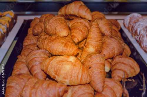 Freshly baked french croissants ready for serving. photo