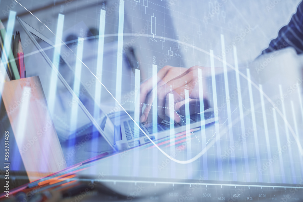 Double exposure of woman hands typing on computer and forex chart hologram drawing. Stock market invest concept.
