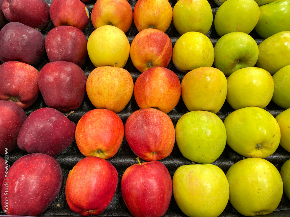 A bin of stacks of apples A bin of stacks of apples