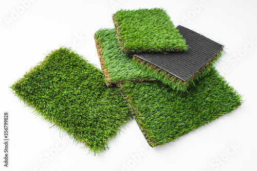 Detail of types of artificial grass in a sample book. photo