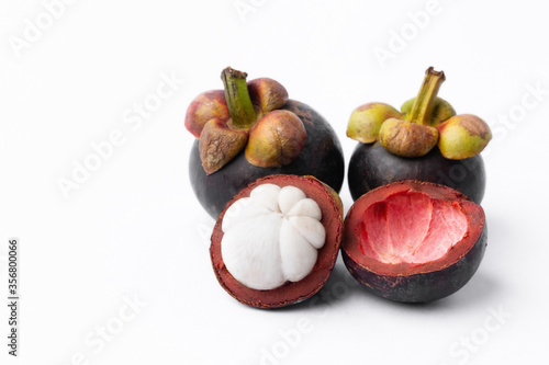 Tropical mangosteen on white background