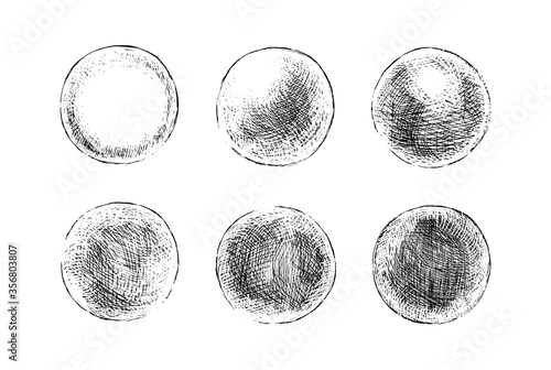 Hand drawn shaded spheres. Simple black and white pen and ink doodle sketches of circles with different types of shading texture. Shading tutorial, organic hand drawn design elements.