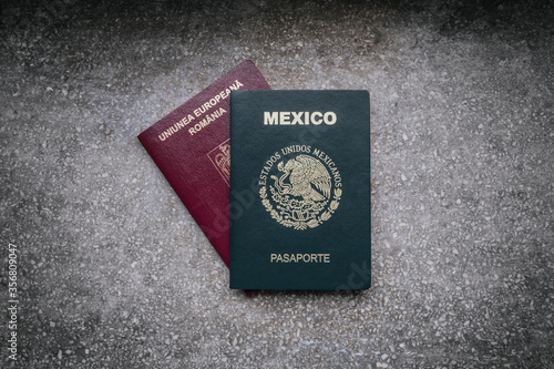 Two passports from different countries, Mexican passport and Romanian passport