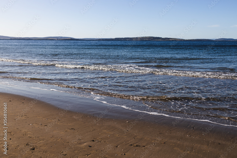 beautiful pristine Tasmanina beach on a winter morning beautiful pristine Tasmanina beach on a winter morning