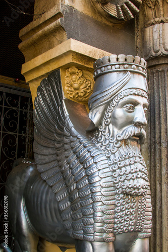A lamassu statue as a deity at the entrance of Parsi Fire Temple in south Mumbai India. 
This is a place of worship for Zoroastrians photo