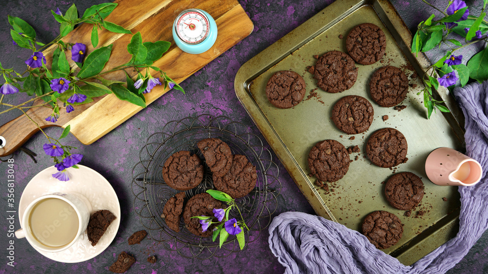 Baking double chocolate chip homemade cookies creative concept flat lay. Top view overhead. Baking double chocolate chip homemade cookies creative concept flat lay. Top view overhead.