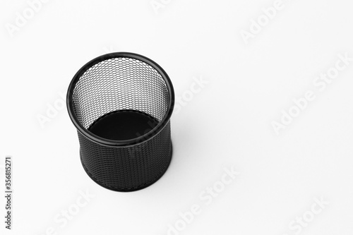 Empty black basket Pen holder on white background
