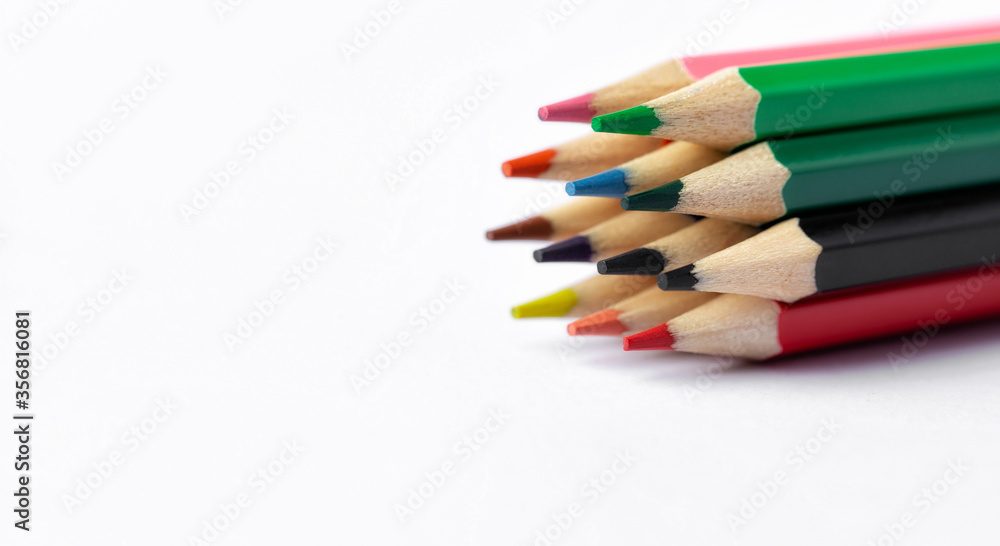 Color pencils on white background.Close up. Color pencils on white background.Close up.
