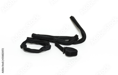 Black wire for strap on white background.