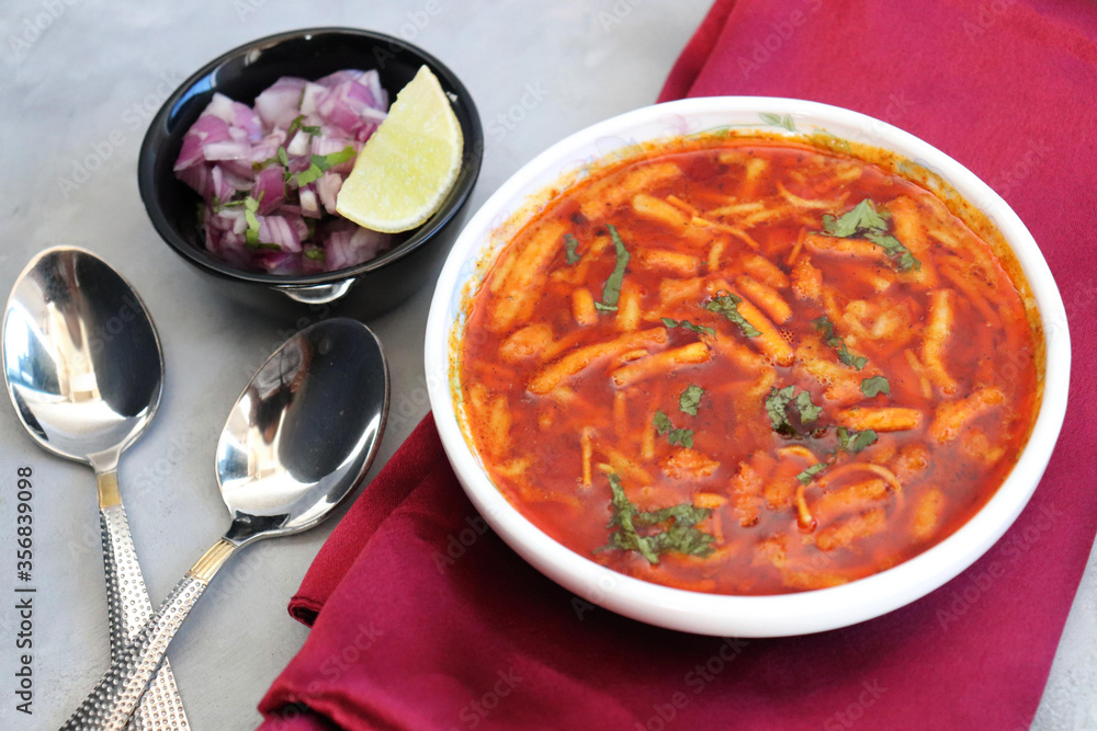 Traditional Sev bhaji or sev tamatar nu Shaak. its a sweet & spicy
