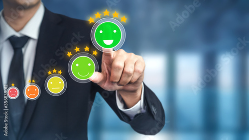 Customer review satisfaction feedback survey concept. User give rating to service experience on online application. Customer can evaluate quality of service leading to reputation ranking of business. photo