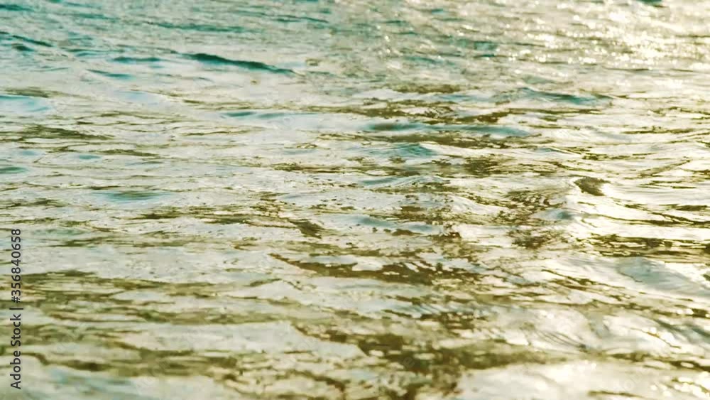 Rippling Water On The Ocean With Waves And Sunlight Reflection In Willemstad, Curacao. - wide shot Rippling Water On The Ocean With Waves And Sunlight Reflection In Willemstad, Curacao. - wide shot
