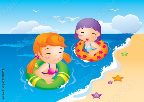 girls swimming in beach water