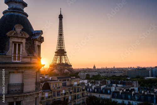 Beautiful sunrise of Paris with the view of Eiffel Tower and city of Paris, France © ReubenTeo