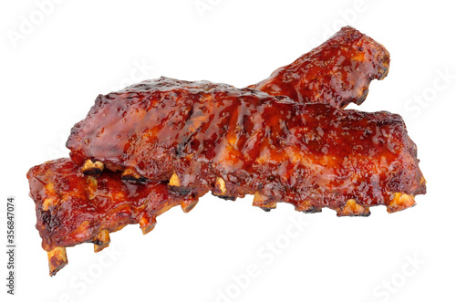 Obraz na plátne Slow cooked Peking style racks of pork ribs with a sticky plum sauce covering is