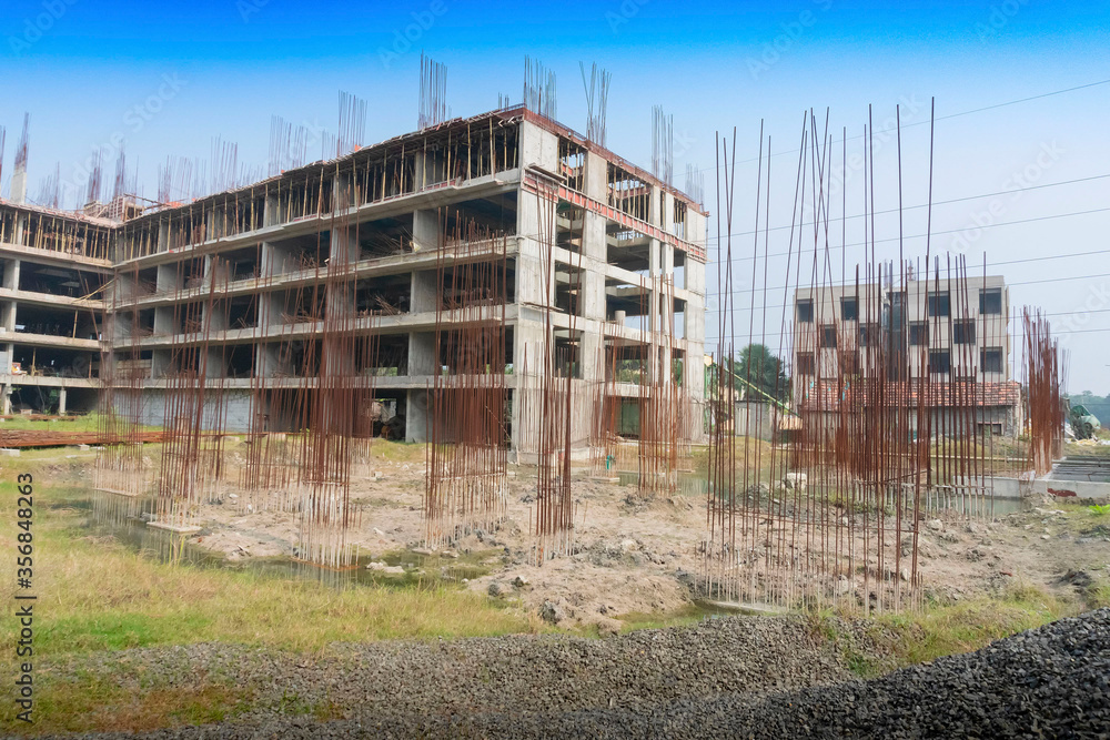 New building complex being built at Rajarhat New Town area of Kolkata, West Bengal, India. Kolkata is one of the fastest growing city in eastern region of India. Real estates are growing fast.