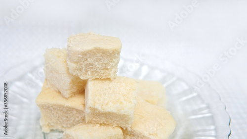 Diced white bread cubes in a glass plate 