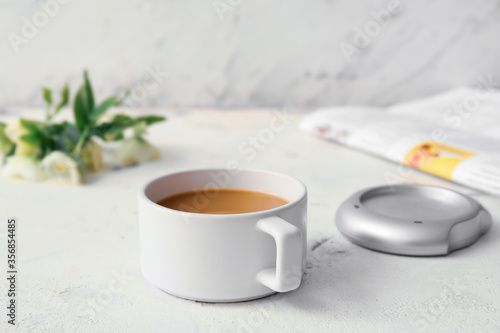 Cup of coffee with heater o...