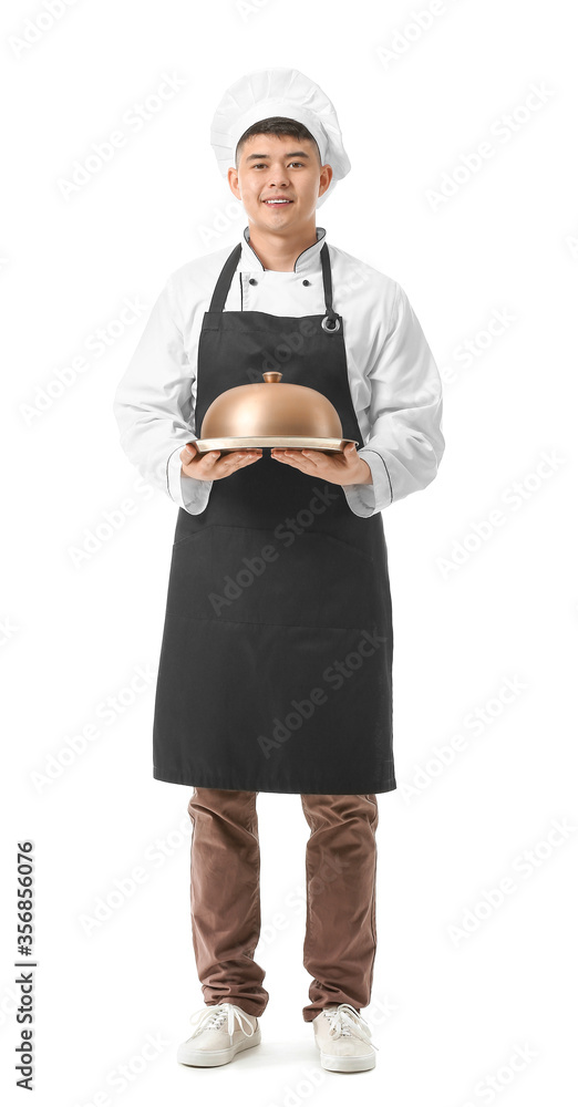 Handsome Asian chef with tray on white background Handsome Asian chef with tray on white background