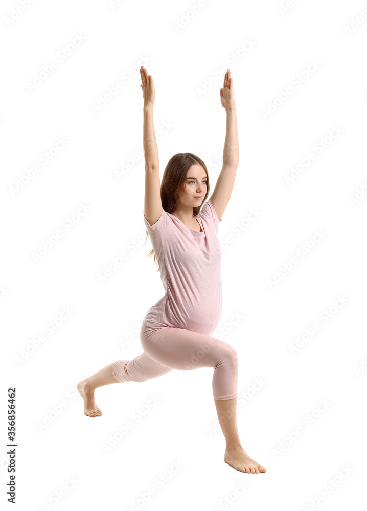 Young pregnant woman practicing yoga on white background Young pregnant woman practicing yoga on white background