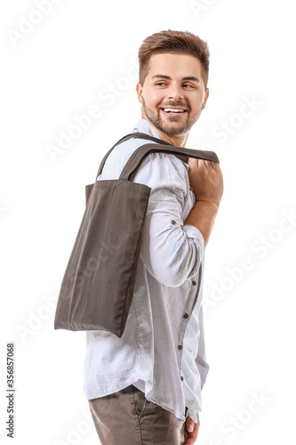 Young man with eco bag on w...