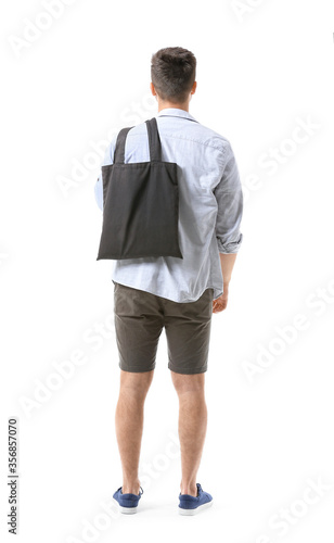 Young man with eco bag on w...