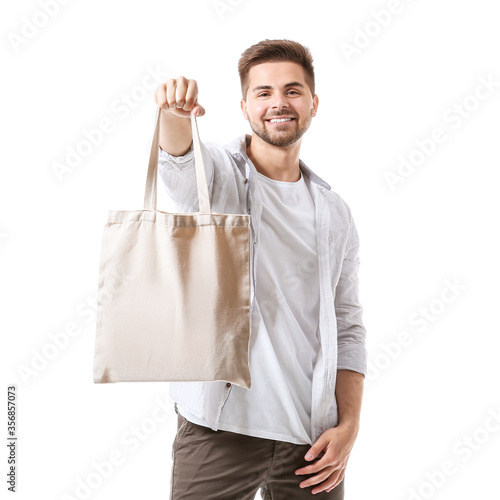 Young man with eco bag on w...