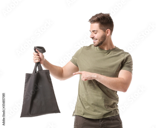 Young man with eco bag on w...