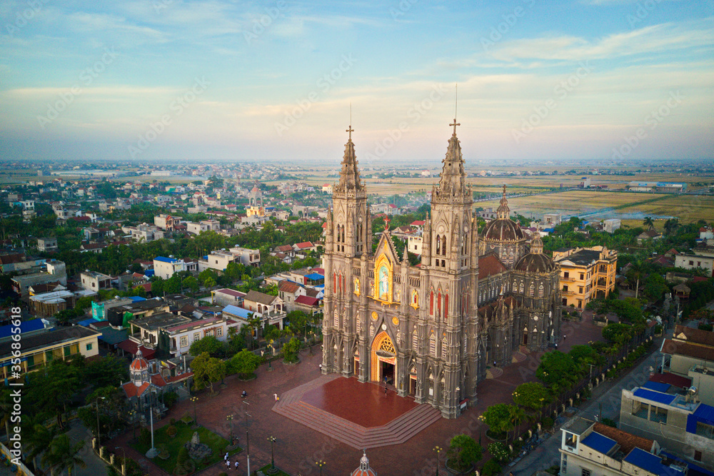 NAMDINH, VIETNAM - JUNE 7TH 2020: Hung Nghia Cathedral District at sunset. This is one of the most beautiful churches in Vietnam.