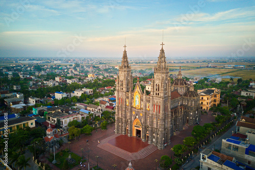 NAMDINH, VIETNAM - JUNE 7TH 2020: Hung Nghia Cathedral District at sunset. This is one of the most beautiful churches in Vietnam.