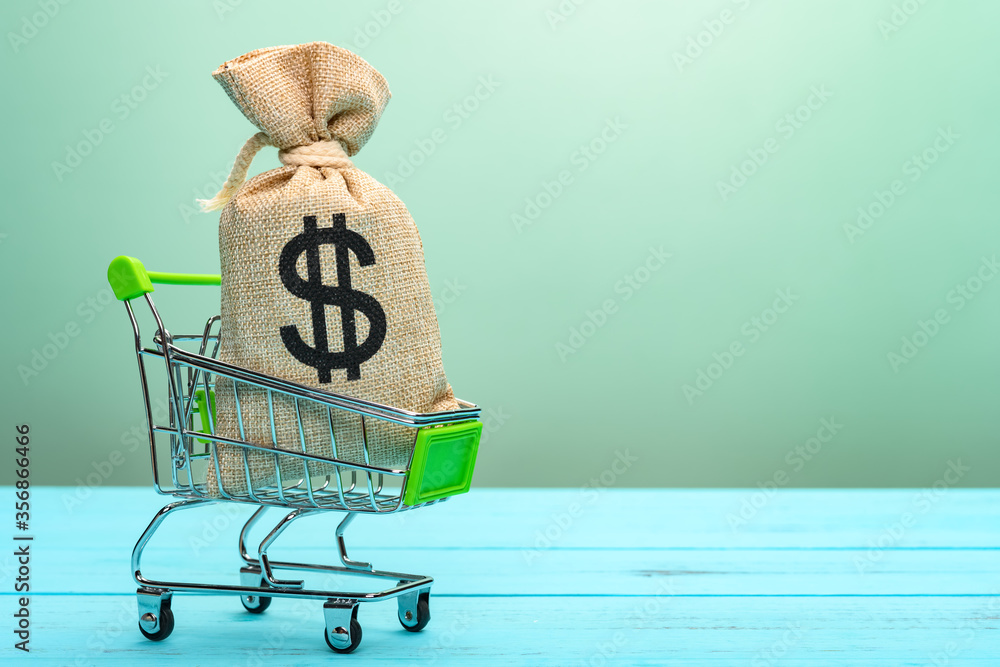 © Freer - shopping cart with a bag with US dollar symbol