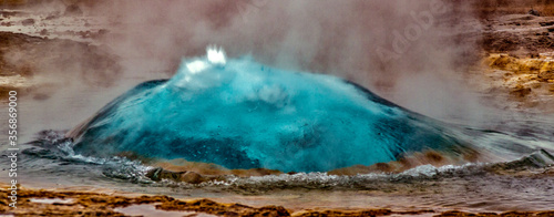 Geyser in Iceland begins eruption by first forming a bubble of hot water, before bursting into the air