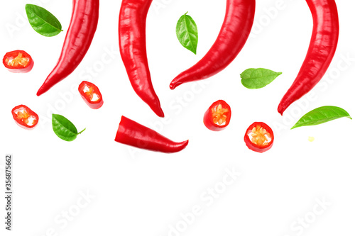 sliced red hot chili peppers isolated on white background top view