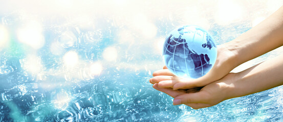 Card for Water Day or World Oceans Day. Saving environment, save, protect clean planet and ecology, sustainable lifestyle concept. Blue planet crystal glass globe in human hand on pure sea background.