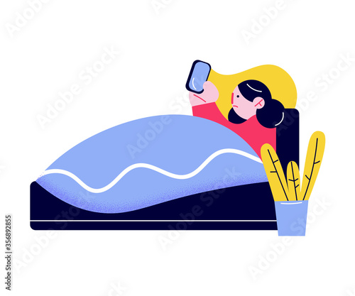 Sick woman lying in bed at home and getting online help from doctor