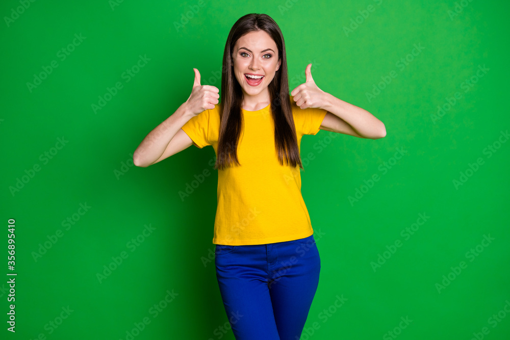 Portrait of her she nice-looking attractive pretty lovely glad cheerful cheery straight-haired girl showing double thumbup advert ad isolated on bright vivid shine vibrant green color background Portrait of her she nice-looking attractive pretty lovely glad cheerful cheery straight-haired girl showing double thumbup advert ad isolated on bright vivid shine vibrant green color background