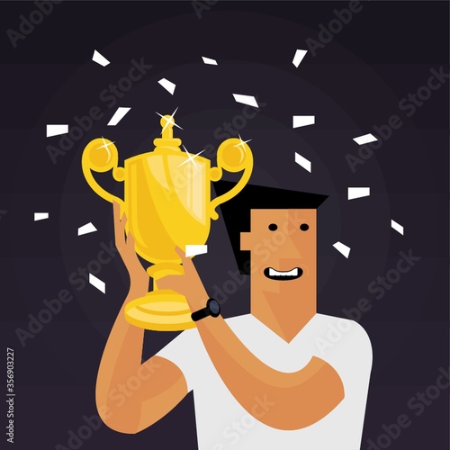 man holding a trophy and cheering
