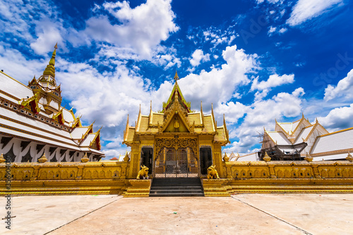 Nakhon Pathom, Thailand - June, 09, 2020 : The golden church of Chareon Rat Bamrung Temple (Nong Phong Nok Temple) the place of faith in Nakhon Pathom,Thailand photo