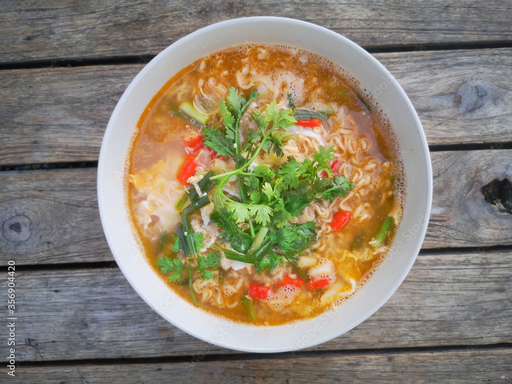 The noodles and spices are in a ready-to-eat bowl. The noodles and spices are in a ready-to-eat bowl.