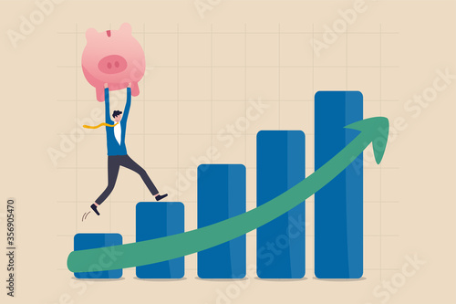 Growth stock, prosperity economic or growth return in savings and investment concept, confident businessman investor hold wealthy pink piggy bank walking up rising green arrow stock market bar graph.