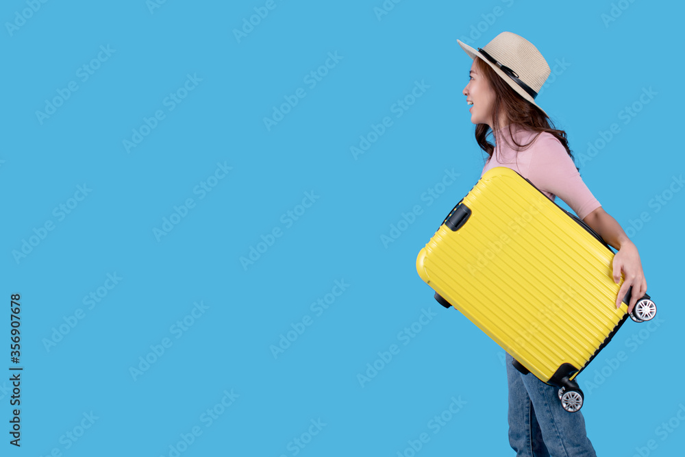 Side view of beautiful Asian tourists. She is excited about traveling in the studio. Side view of beautiful Asian tourists. She is excited about traveling in the studio.