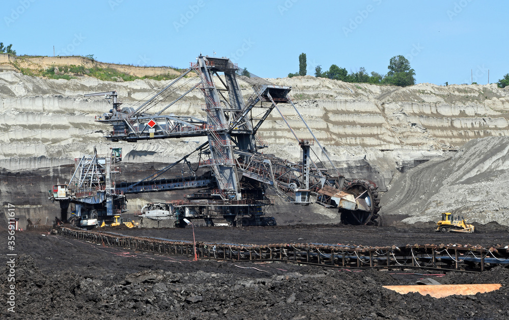 A huge bucket-wheel excavator on the open-pit mine.
A huge bucket-wheel excavator on the open-pit mine.