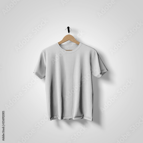 White t-shirt mock up hanging against a plain background 3D Rendering