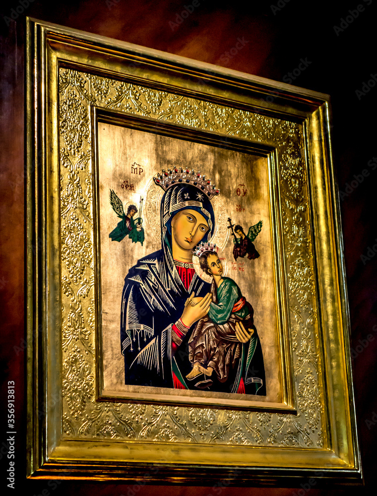 Mother of God appearing in a golden painting