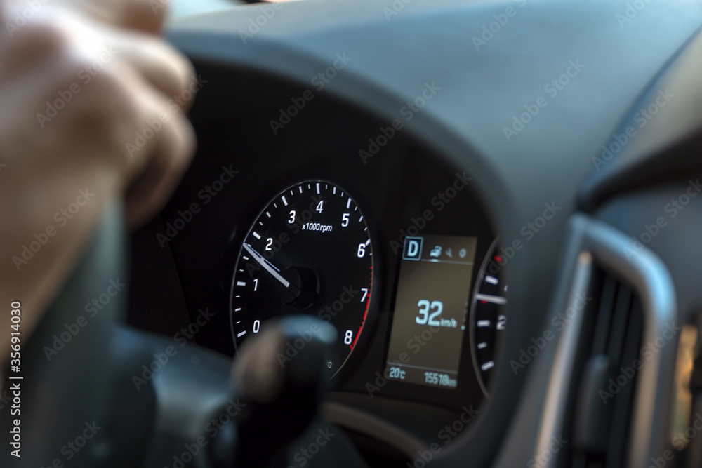 Dashboard and speedometer in the car. Selective focus
