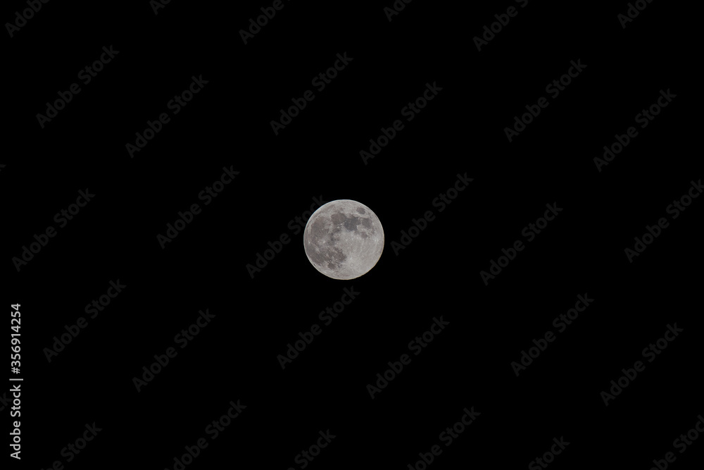Full moon in the sky. Full moon in the black sky. Space wallpaper. High quality photo Full moon in the sky. Full moon in the black sky. Space wallpaper. High quality photo