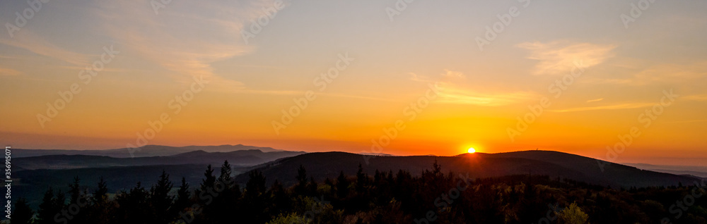 Sunset in the Owl Mountains with a great owl in the background